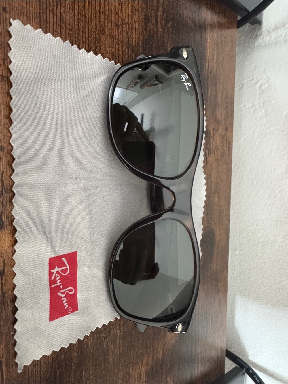 Ray-Ban Black Frame Sunglasses with Dark Lenses